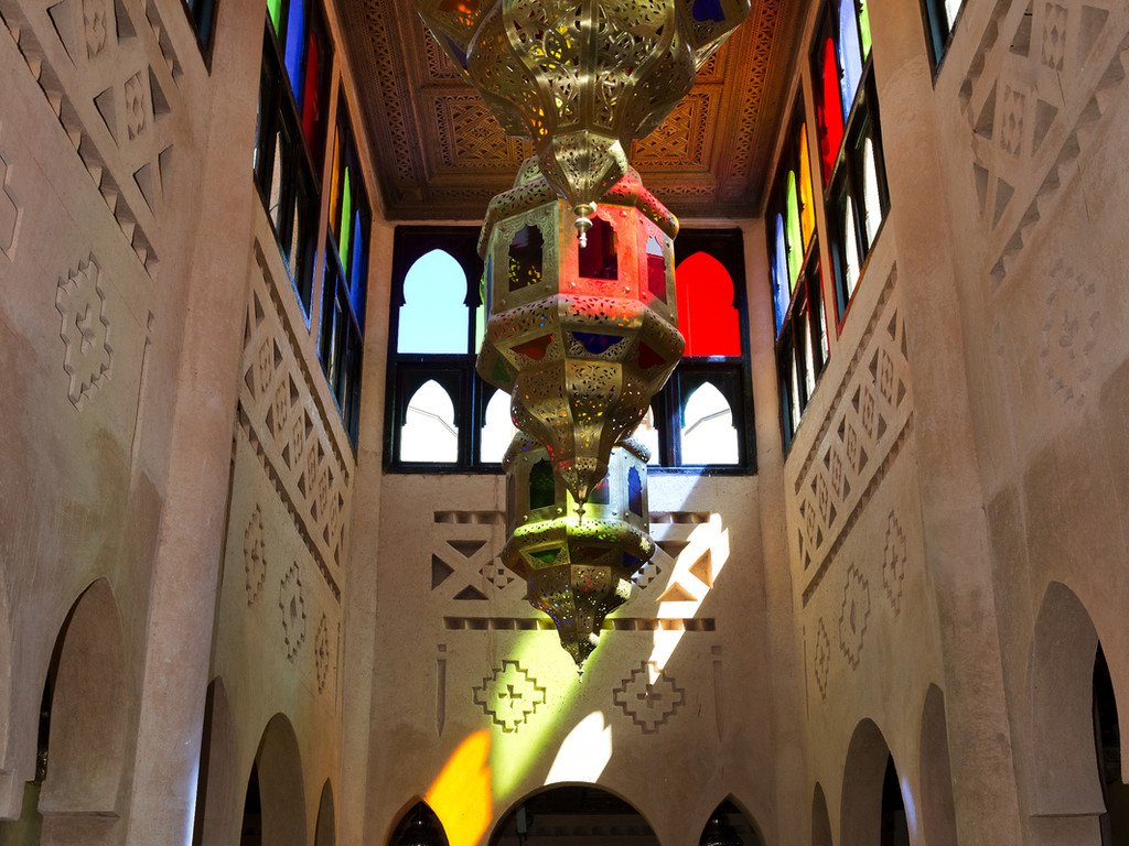 Stained glass and lanterns inside OZ Palace